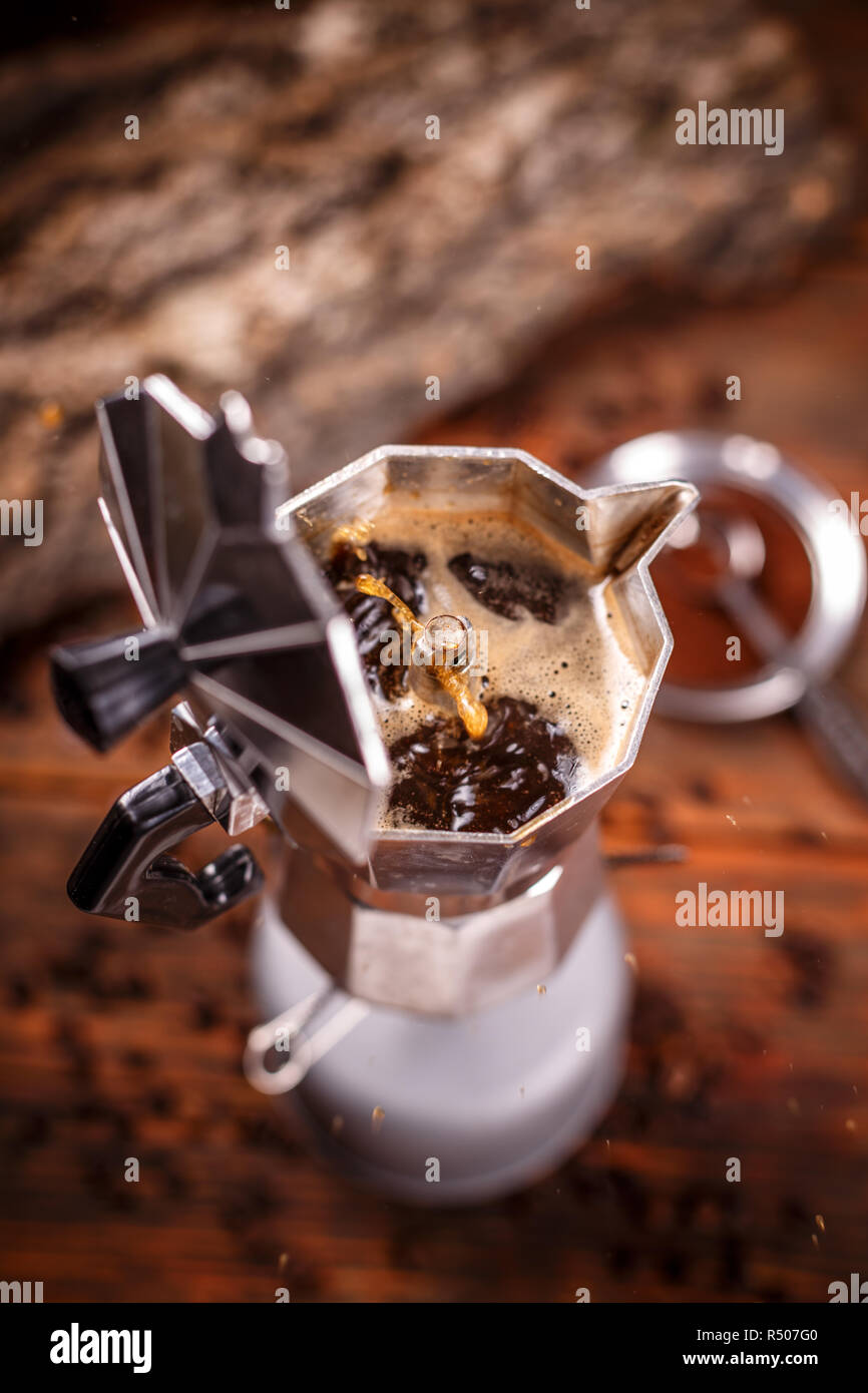 Moka coffee pot on stove Stock Photo Alamy