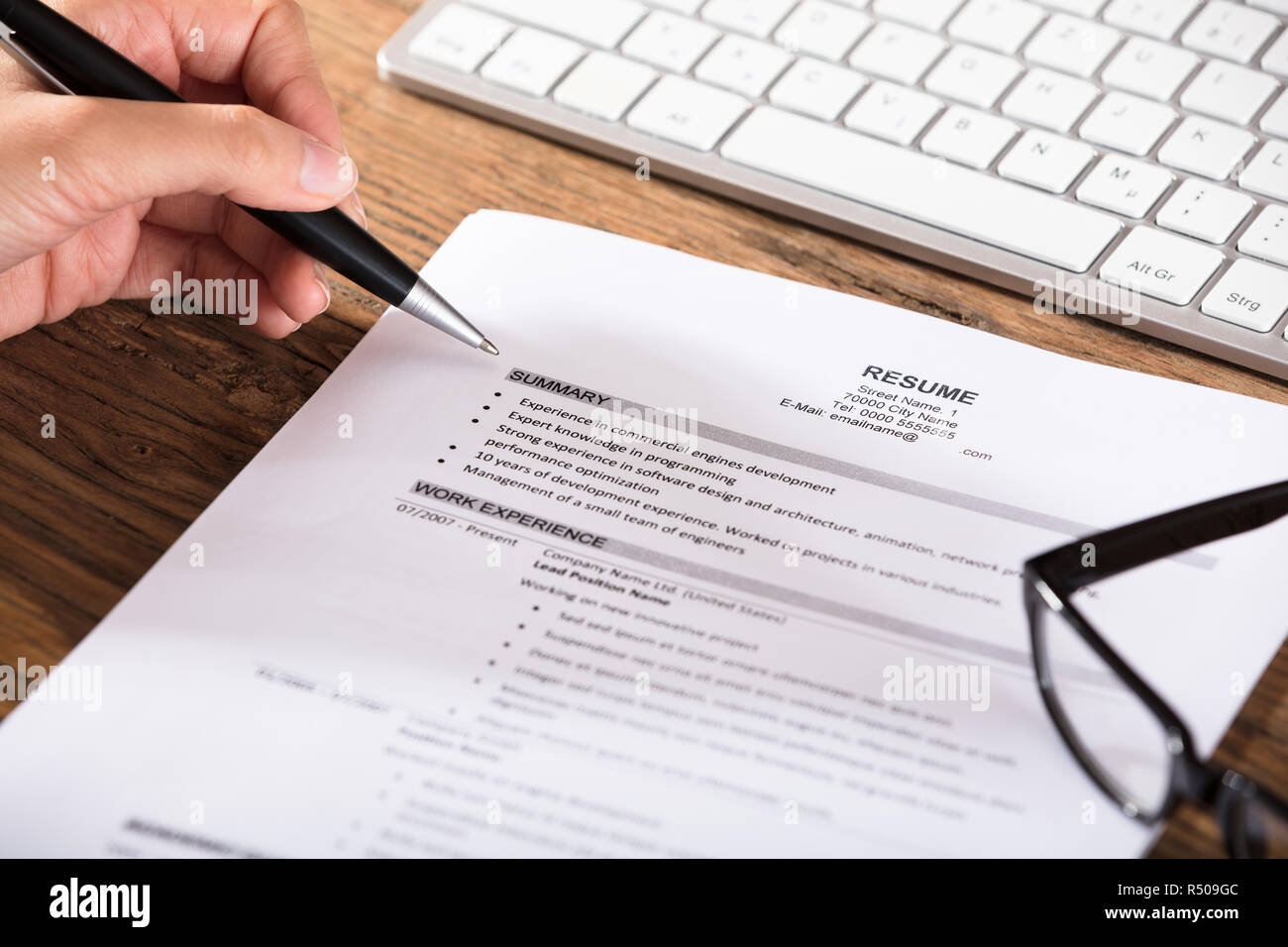 Job Seeker Review Resume Stock Photo