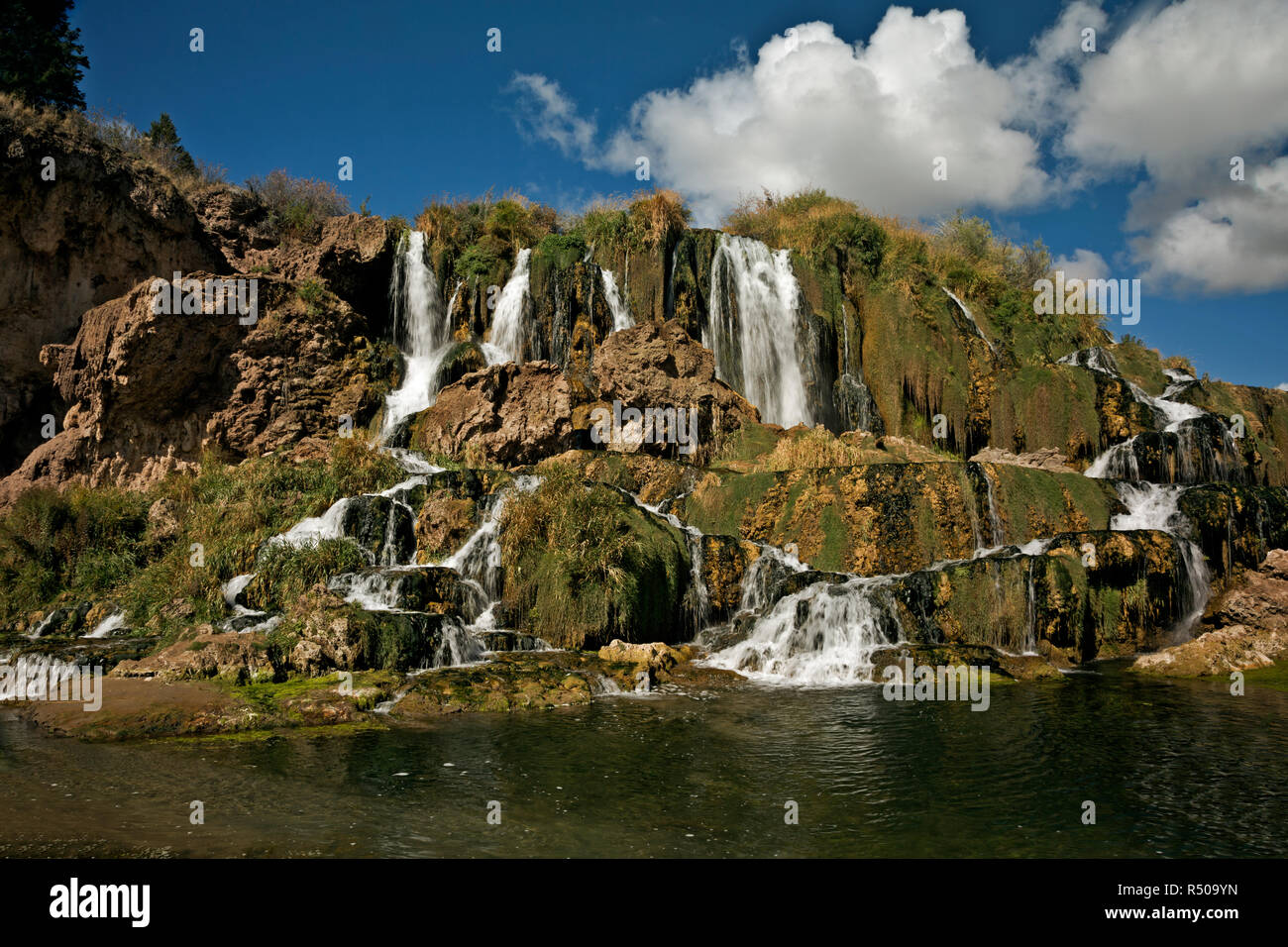 ID0074200...IDAHO Falls Creek descending a terraced hillside to the
