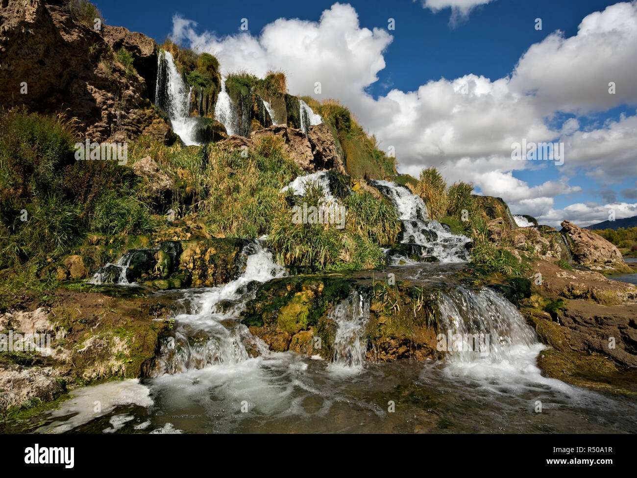 ID0075000...IDAHO Falls Creek descending a terraced hillside to the