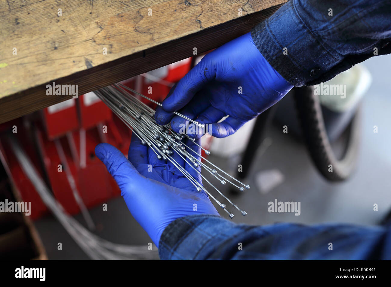 replacement of brake cable in bicycle brakes Stock Photo Alamy