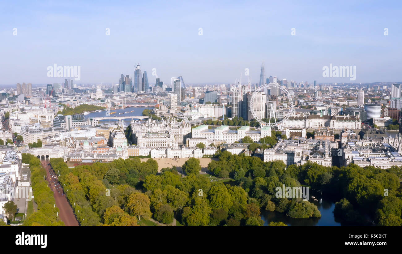 New London Skyline Aerial View one of the Most Beautiful Cities in the World with Iconic Landmarks Wheel, Modern Towers feat. Famous Westminster UK Stock Photo