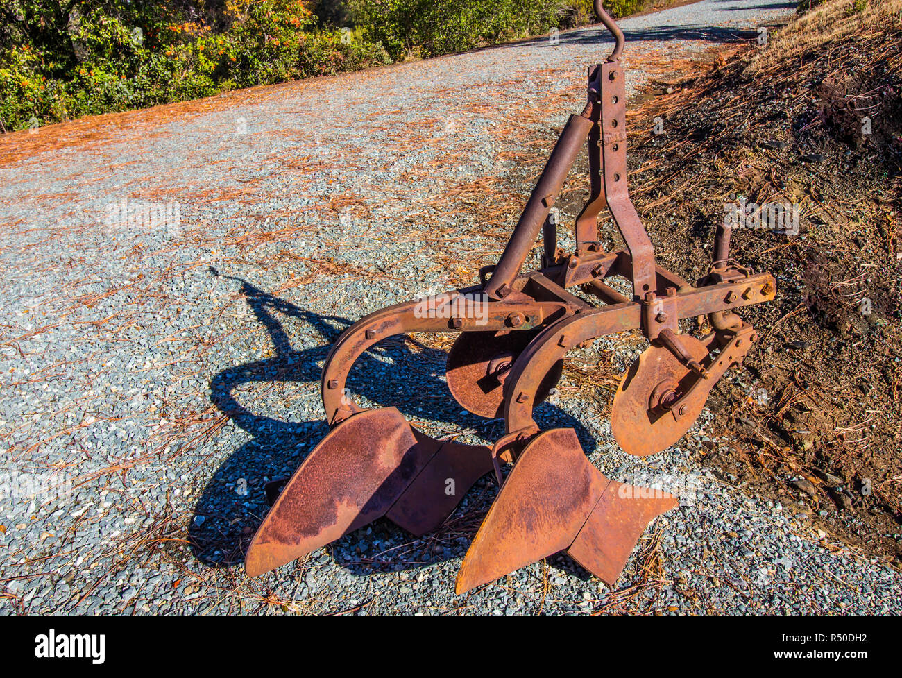 Vintage Rusty Plow Used For Cultivating Stock Photo Alamy