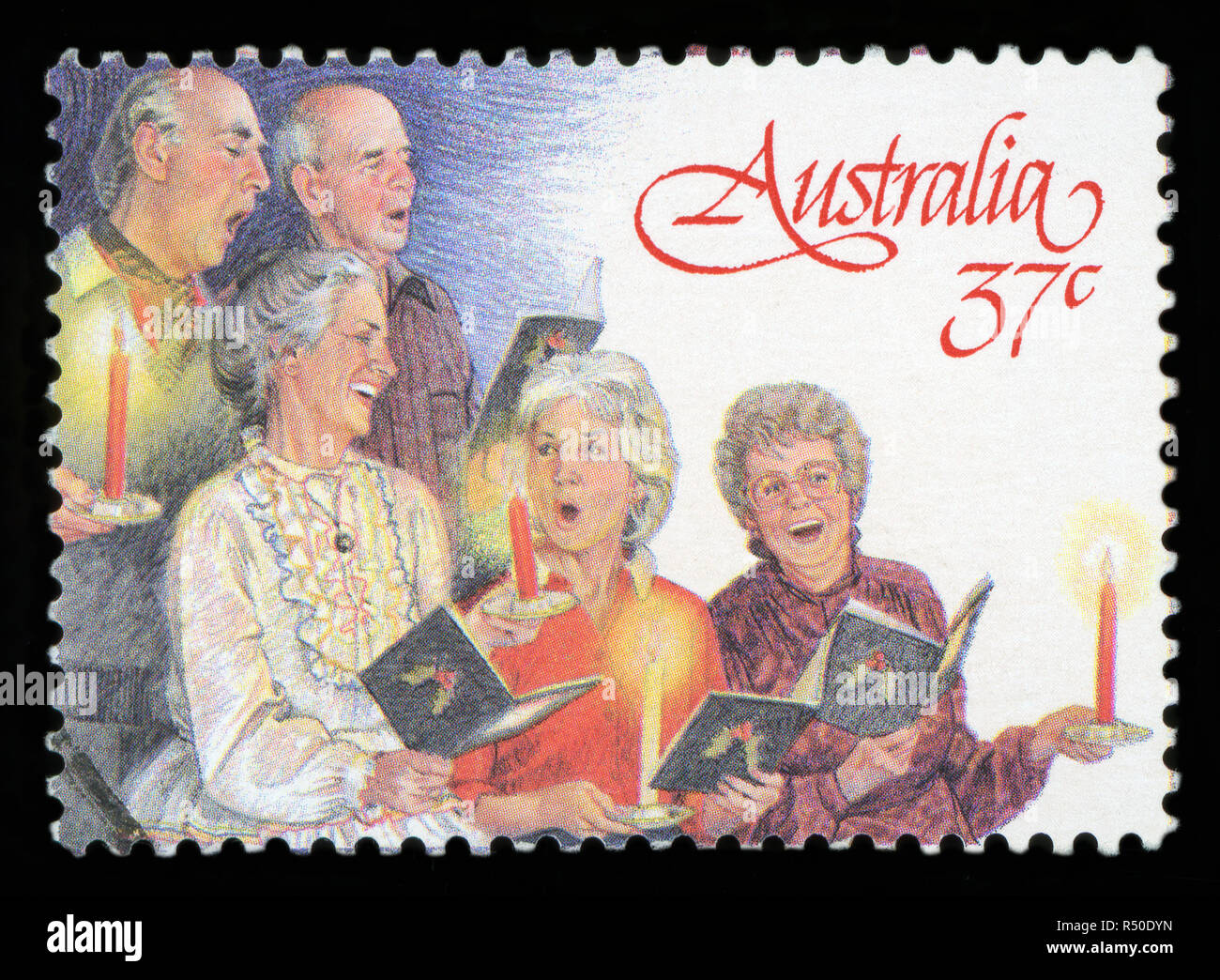 AUSTRALIA - CIRCA 1987: A used postage stamp from Australia, depicting a festive Christmas illustration of Carol Singers, circa 1987. Stock Photo