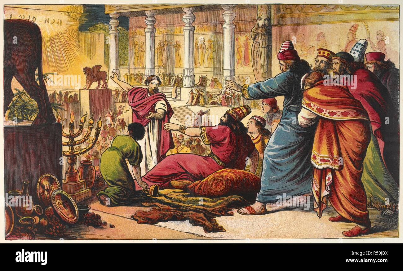 Daniel pointing out the writing on the wall to Nebuchadnezzar. . The