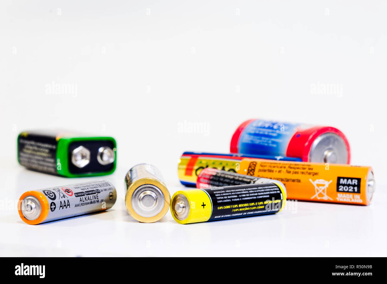 Group of batteries isolated on white background. Recycling concept. Stock Photo