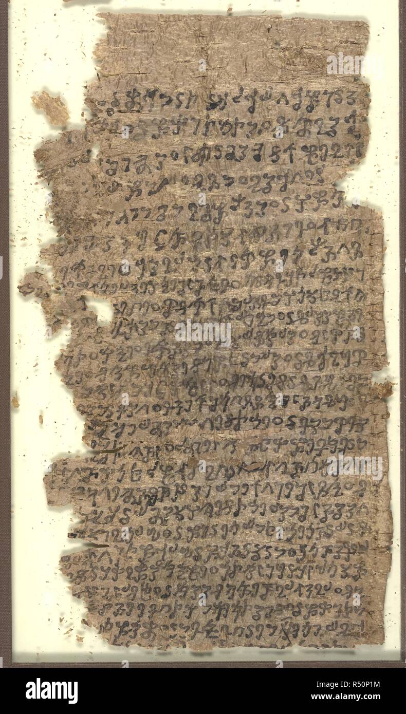 Buddhist text. Kharosthi Buddhist text. The manuscript is written on birchbark and is part of a group of early manuscripts from Gandhara (modern East Afghanistan/Noth-West Pakistan).  Image taken from Kharosthi Buddhist text. . Source: Or. 14915, f.2 bottom. Language: Gandharan. Stock Photo