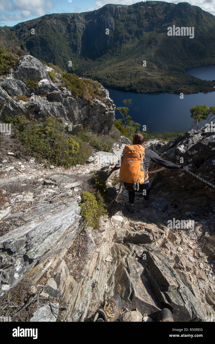 Female Adventurer hiking in Cradle Mountain National Park, Tasmania, Australia Stock Photo
