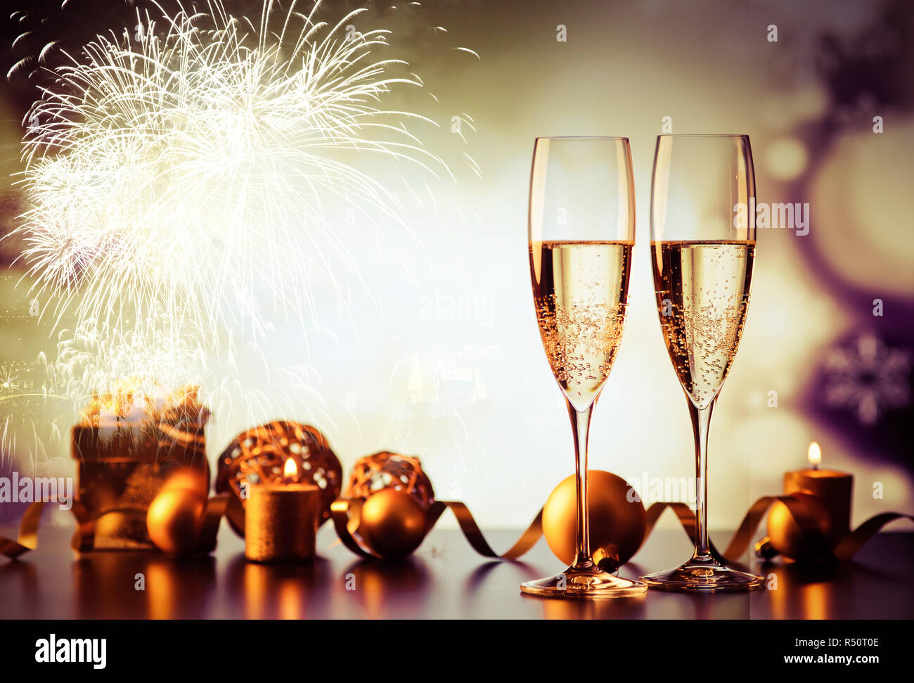 Two champagne glasses splash with drops hi-res stock photography and ...