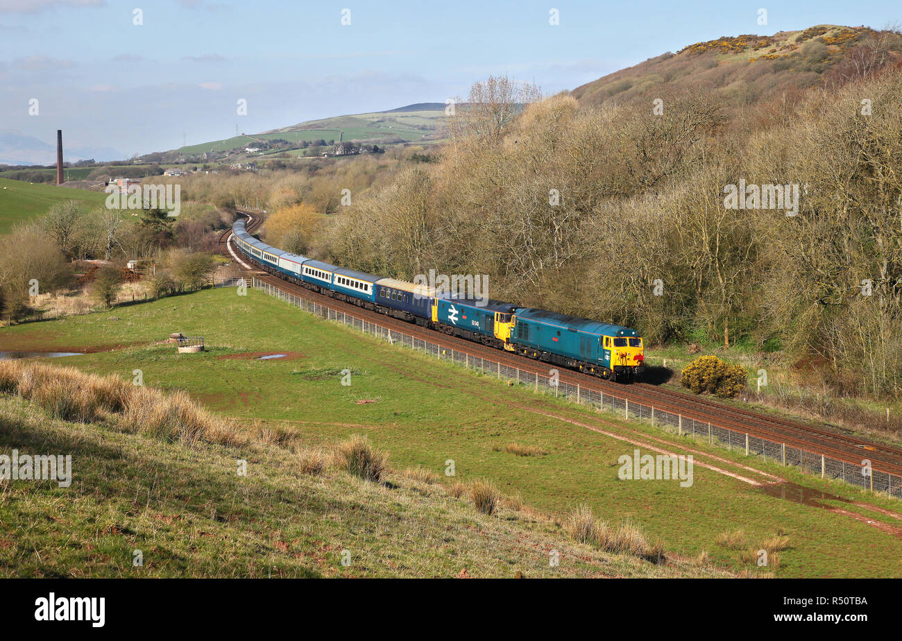 50007 & 50049 head past Park south Jc nr Barrow in furness in April 2018. Stock Photo