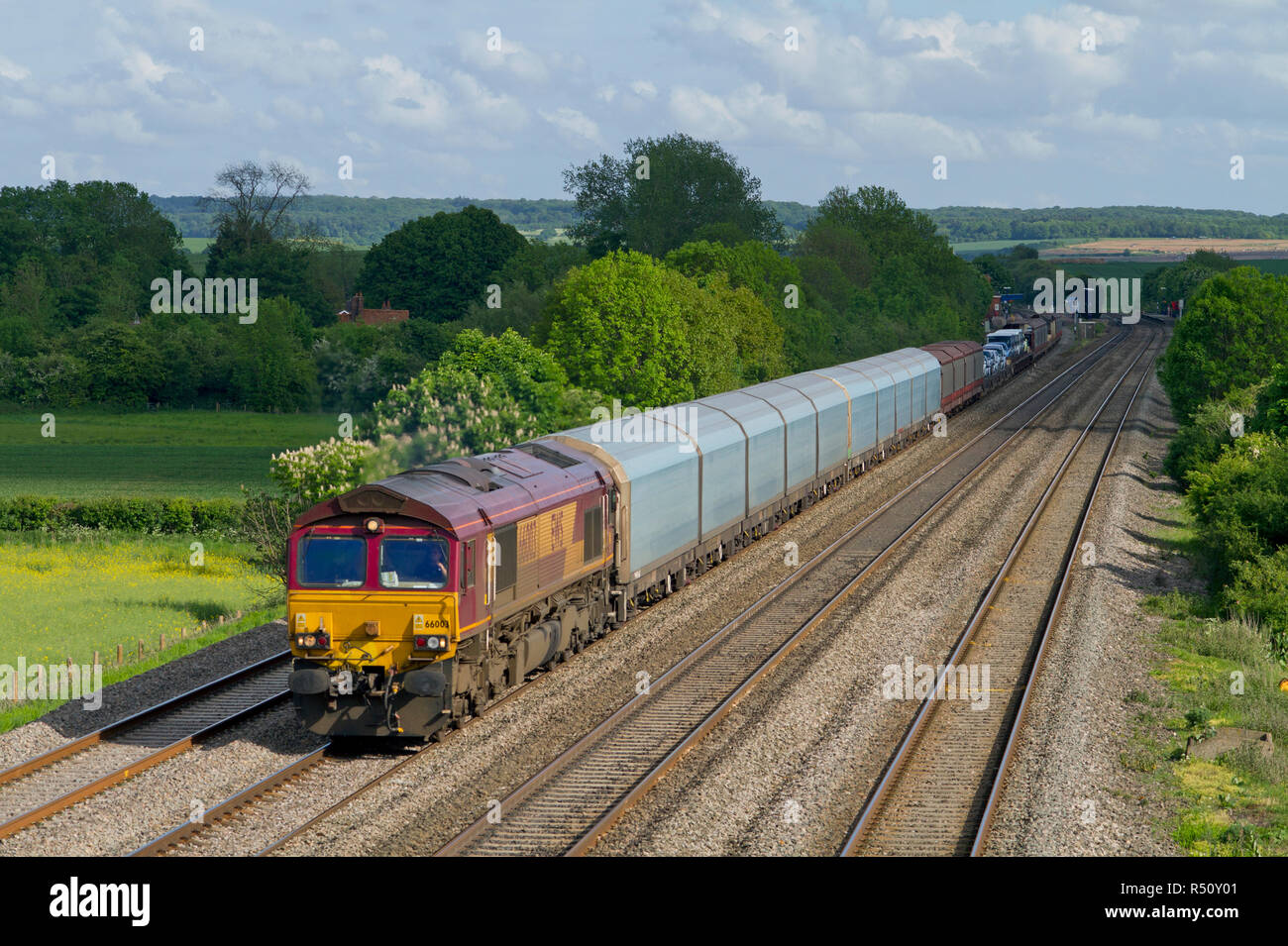 A class 66 diesel locomotive number 66003 working a car train at Cholsey on the Great Western Main Line. Stock Photo