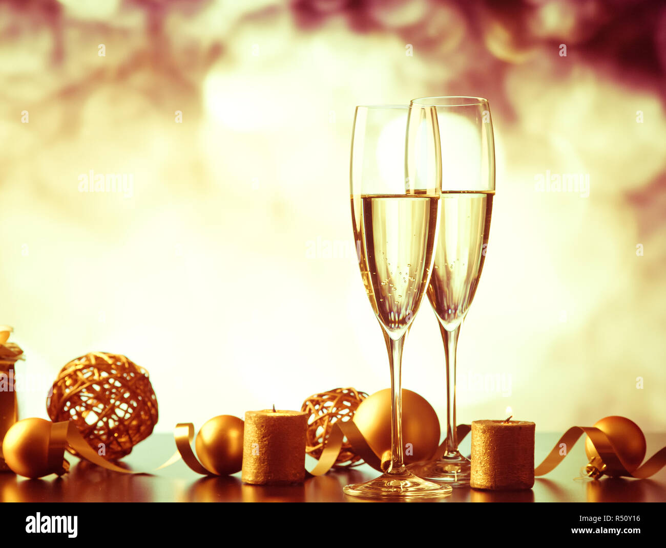Two champagne glasses splash with drops hi-res stock photography and ...