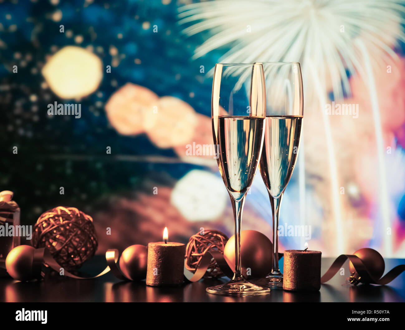 Two champagne glasses splash with drops hi-res stock photography and ...