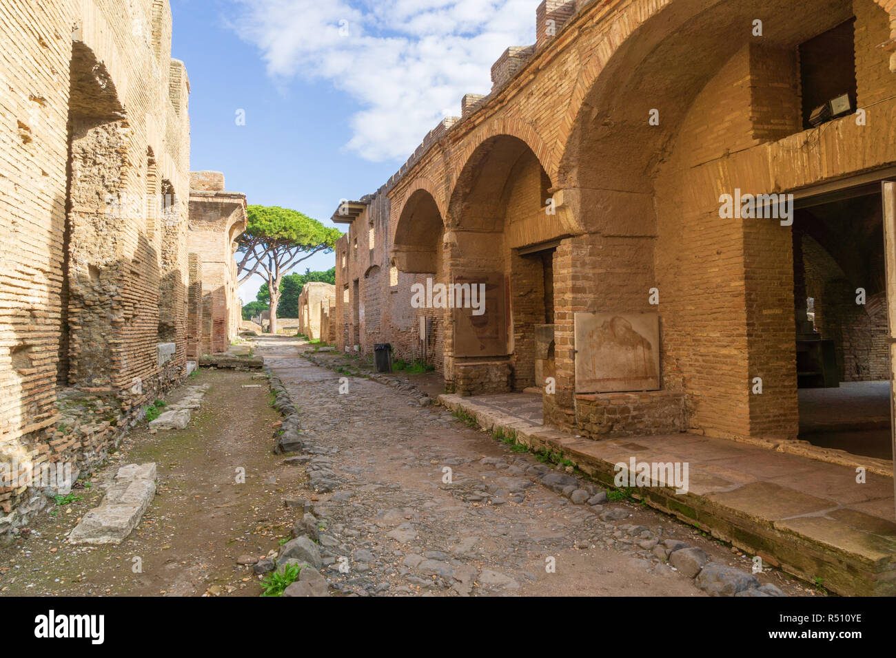 Ostia antica in Rome, Italy. Archaeological Roman empire street view with original ancient Roman buildings Stock Photo