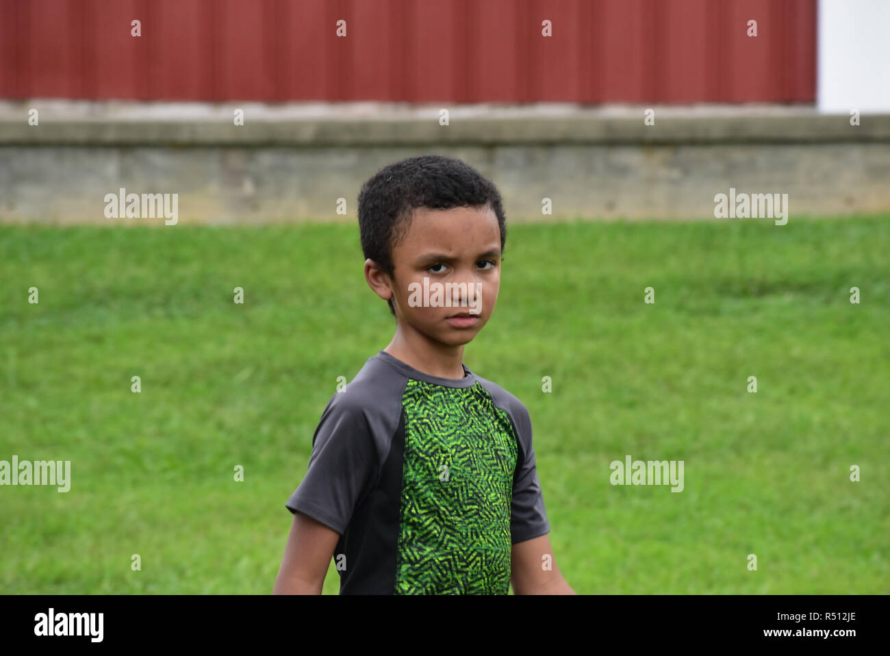 Irritated young boy Stock Photo
