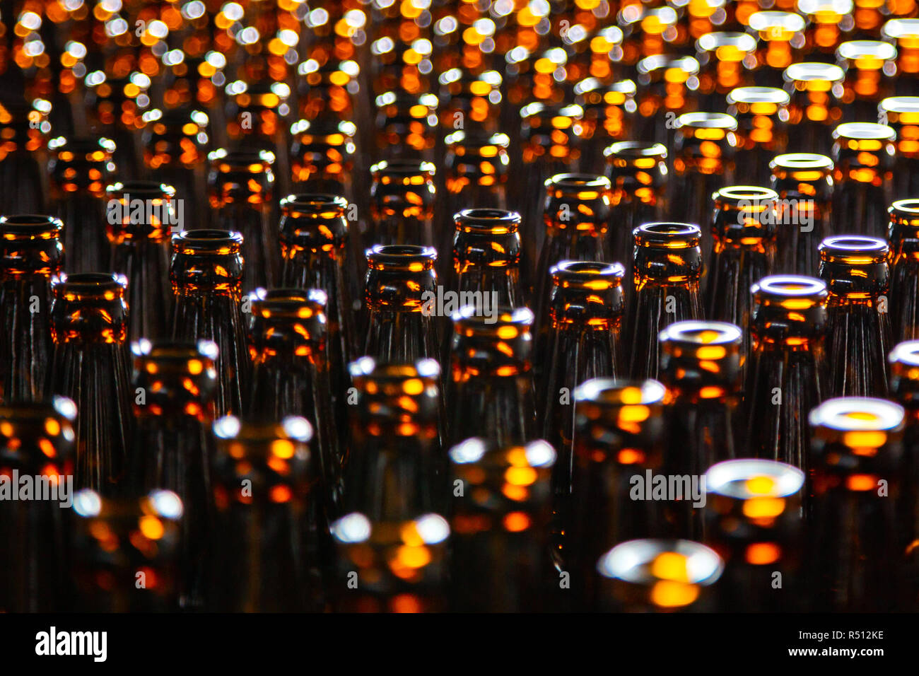 Glass bottle at factory for production of glass containers. Glass bottle texture Stock Photo