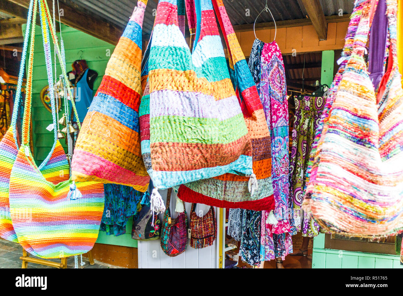 Colourful bags hanging outside a shop in a shopping complex, Kuranda, Queensland, Australia Stock Photo