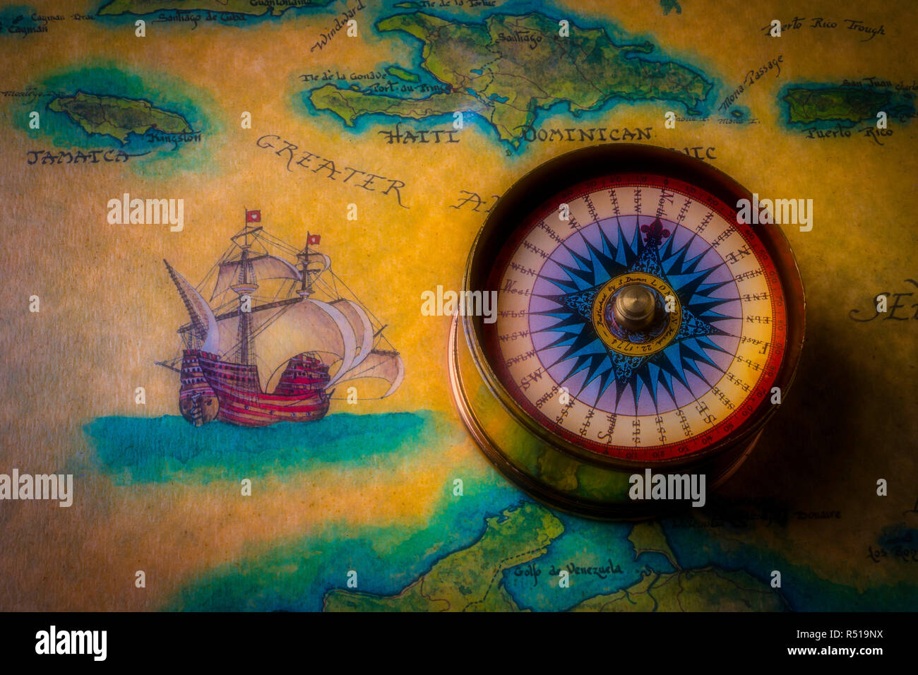 Compass And Ship On Old Map Stock Photo