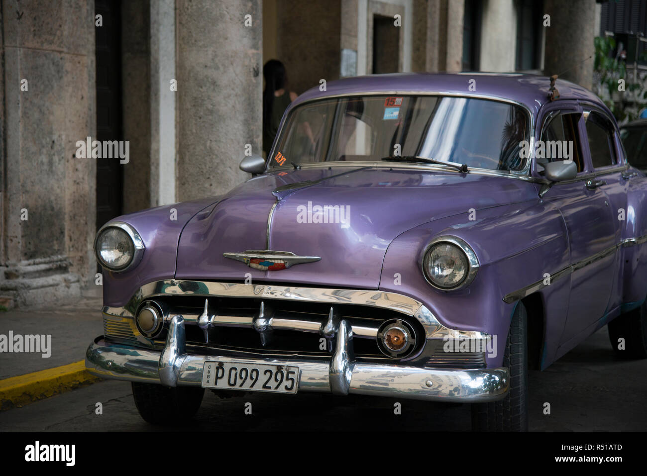 Old Chevy painted violet purple. Stock Photo