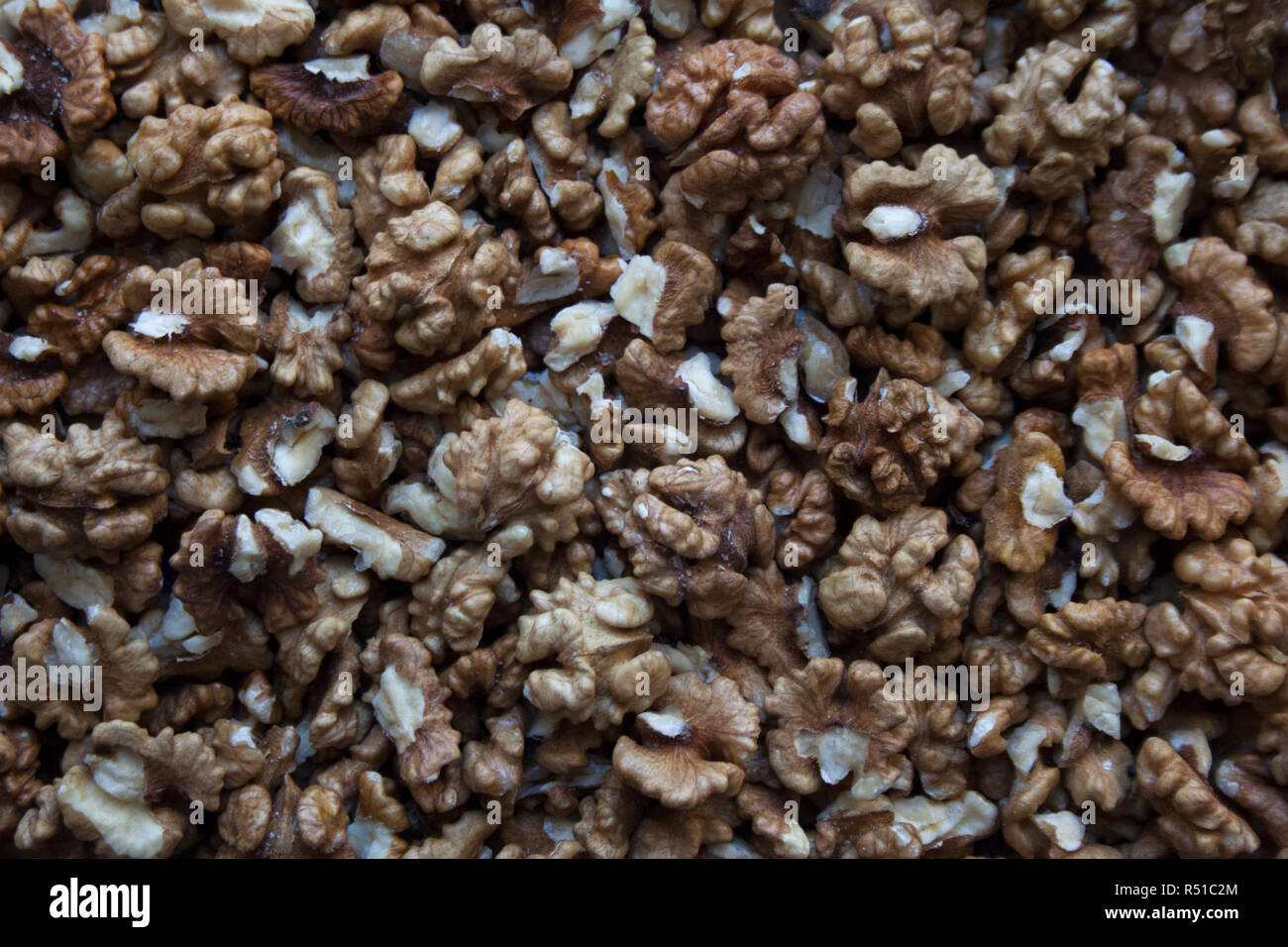 Raw walnut kernels texture abstract background Stock Photo