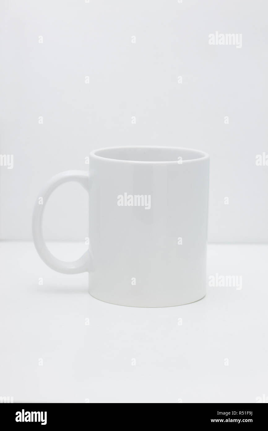 White mug for coffee or tea isolated on white background Stock Photo