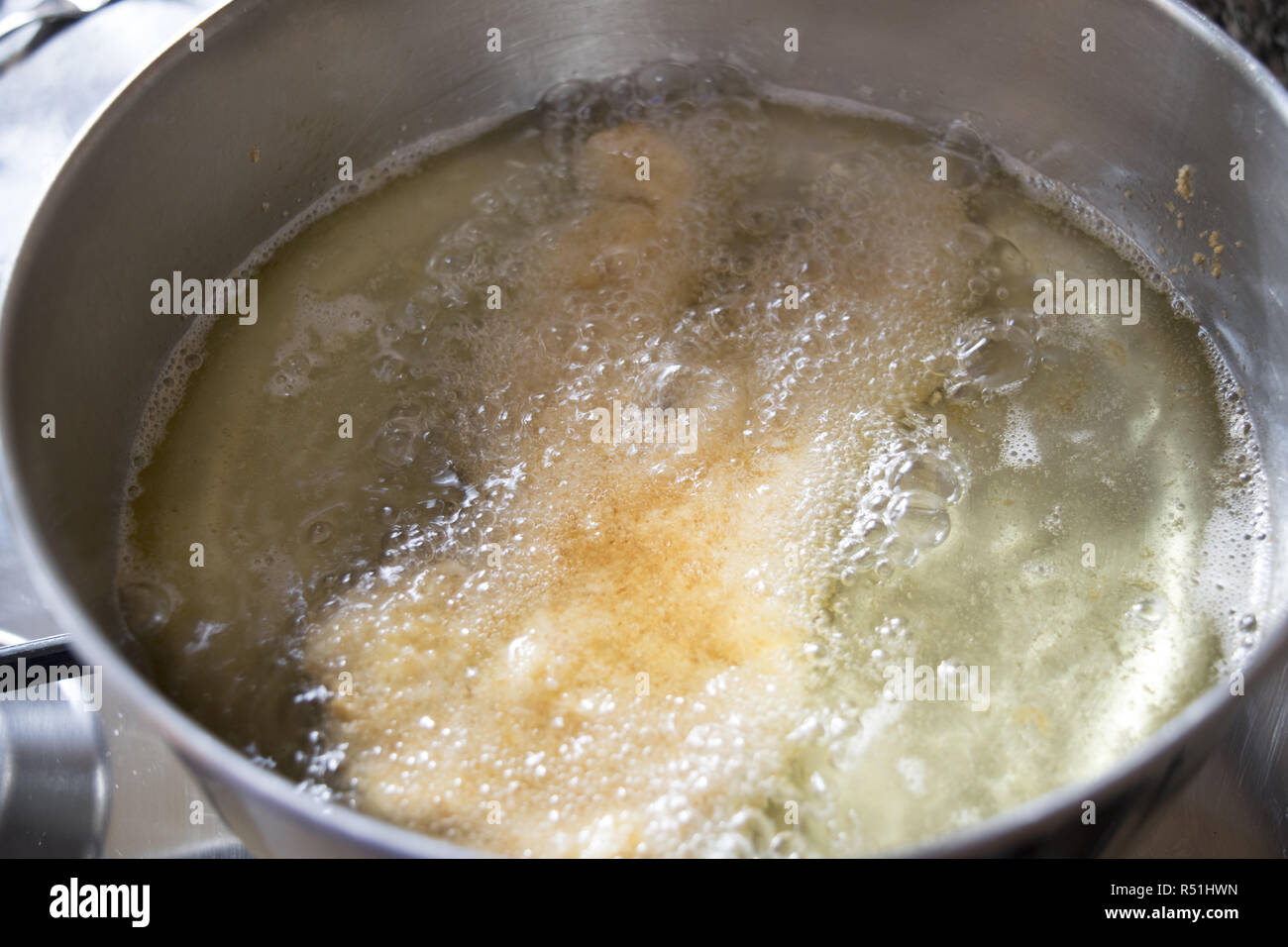 chicken cutlet fried in olive oil Stock Photo Alamy