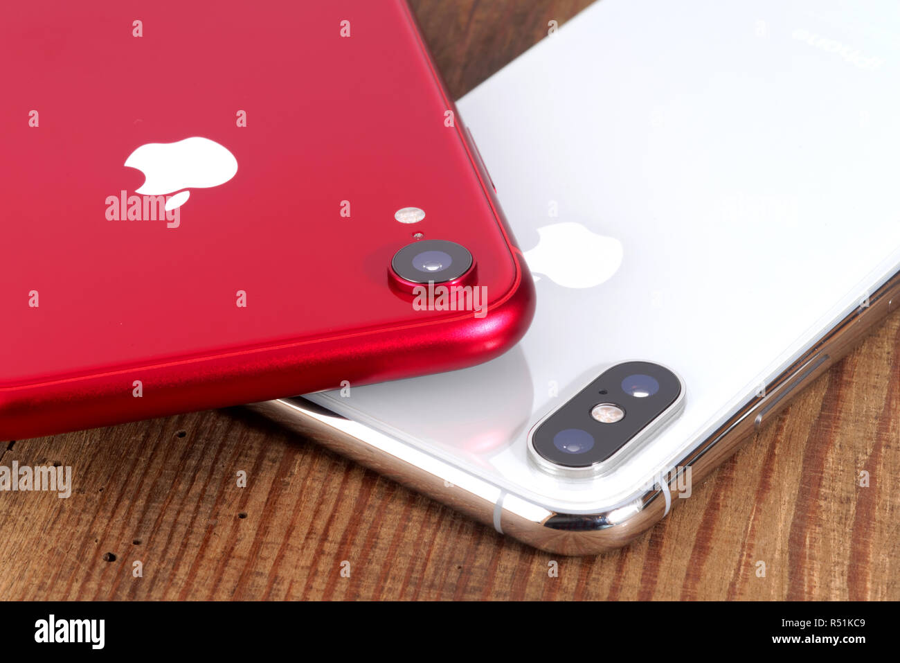 Koszalin, Poland – November 29, 2018: Silver iPhone Xs and red iPhone XR. The iPhone Xs and iPhone XR is smart phone with multi touch screen produced Stock Photo