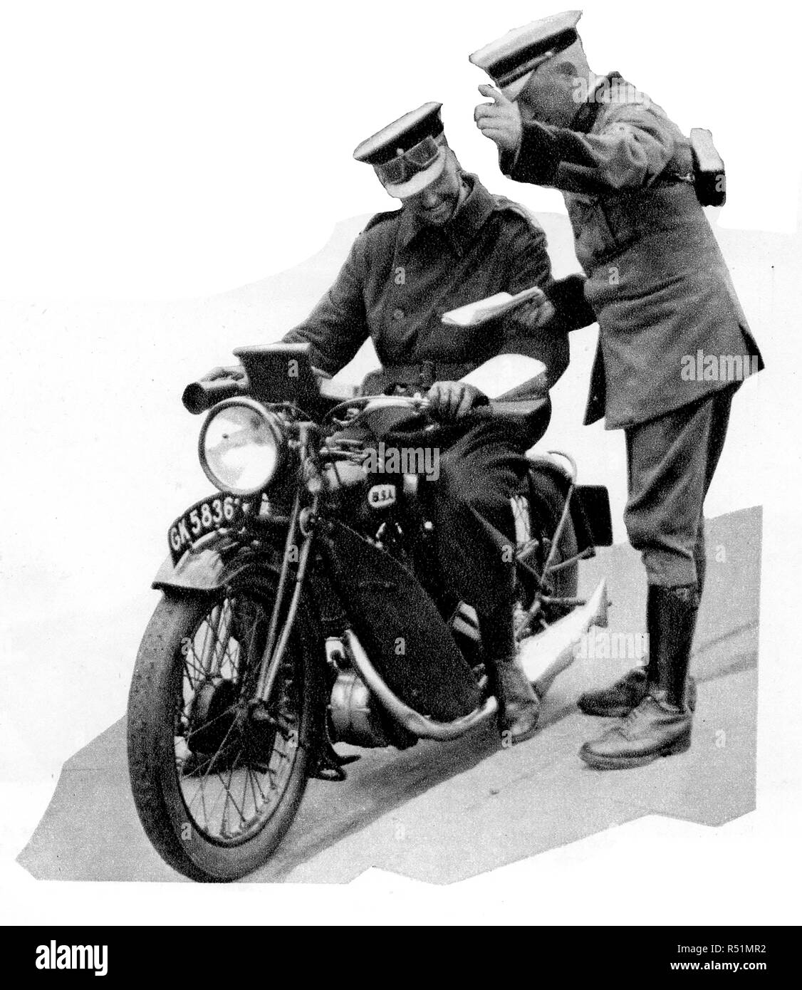 LAW & ORDER IN BRITAIN - An early photograph of  British  traffic  police  using motorcycles Stock Photo