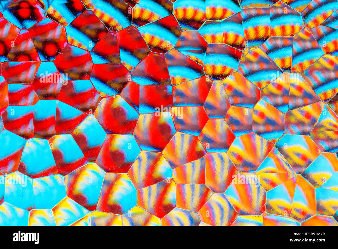 Extreme close up abstract colourful background through frosted glass Stock Photo