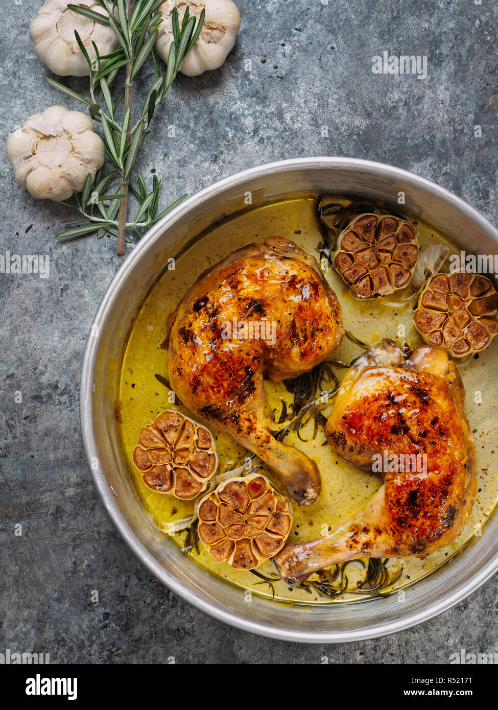 rustic italian roast chicken with garlic and rosemary Stock Photo - Alamy