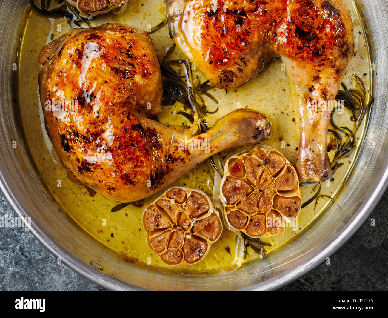 rustic italian roast chicken with garlic and rosemary Stock Photo - Alamy