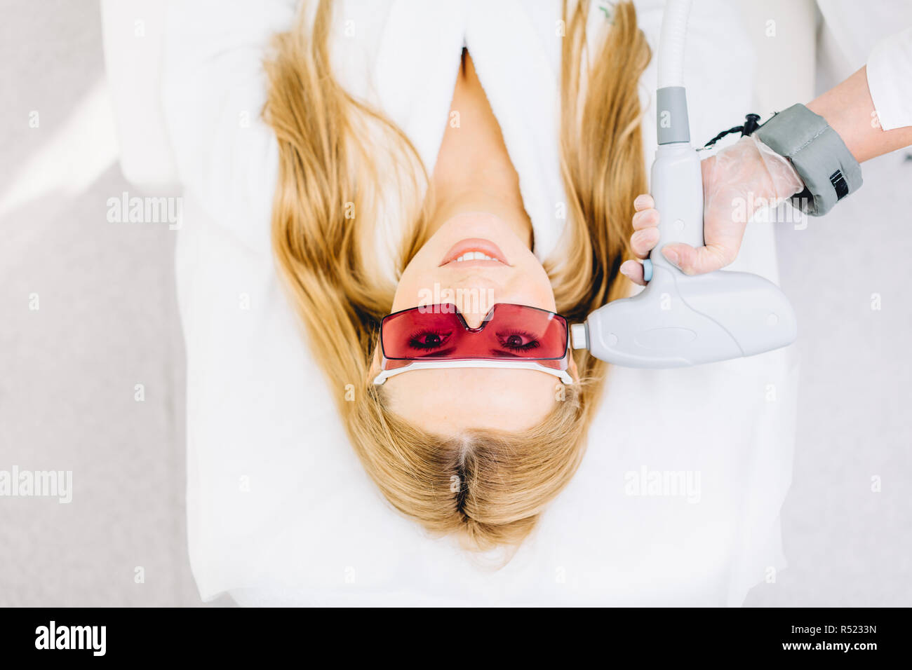 Woman getting ultrasound face hi-res stock photography and images - Alamy