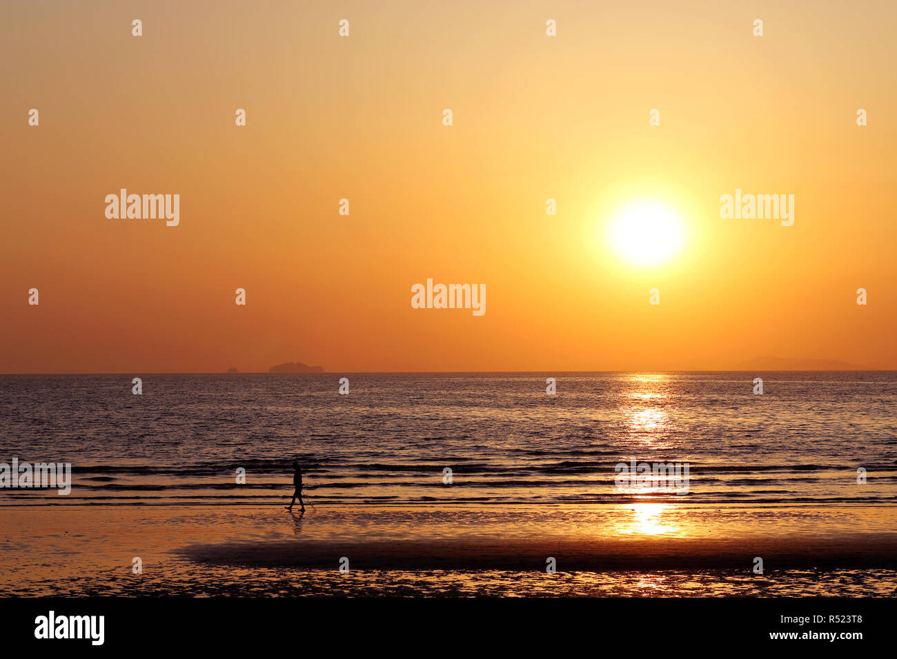 Beautiful sunset beach and sea landscape Stock Photo - Alamy