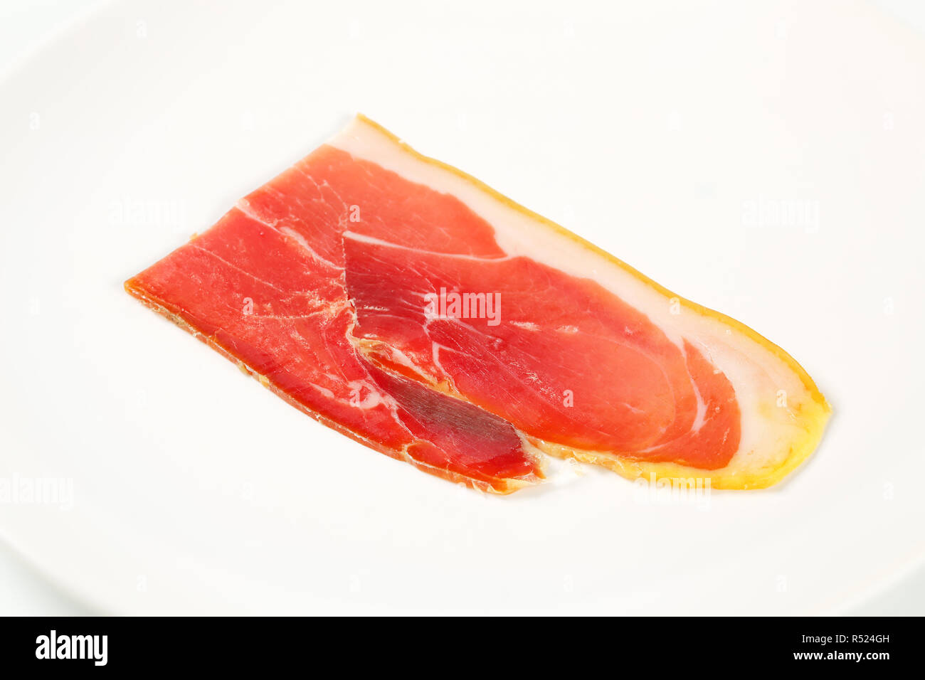 Slice of dry cured ham Stock Photo Alamy