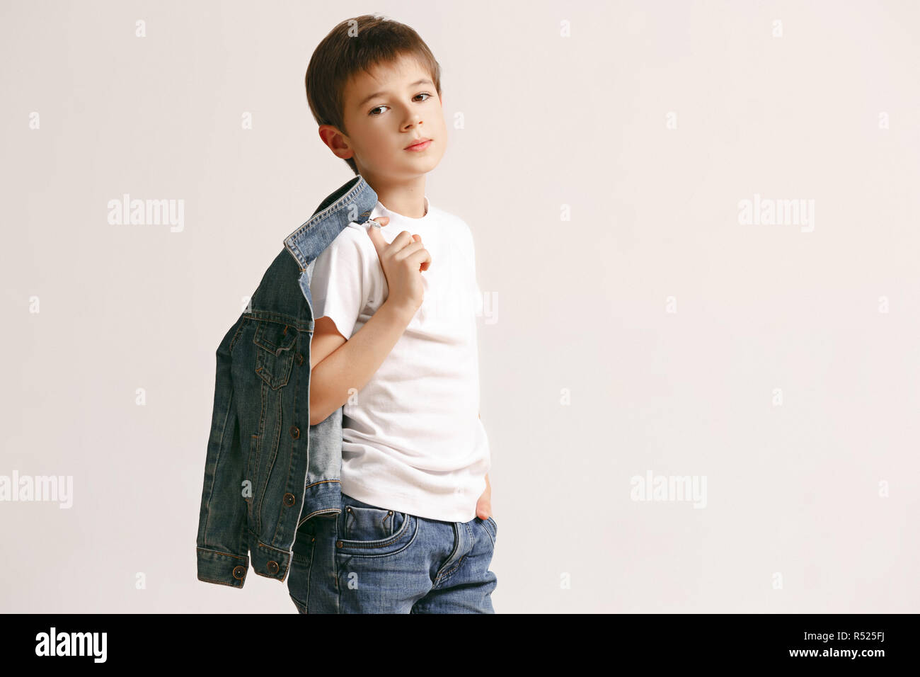 Kid jeans white smile hi-res stock photography and images - Page 3 - Alamy