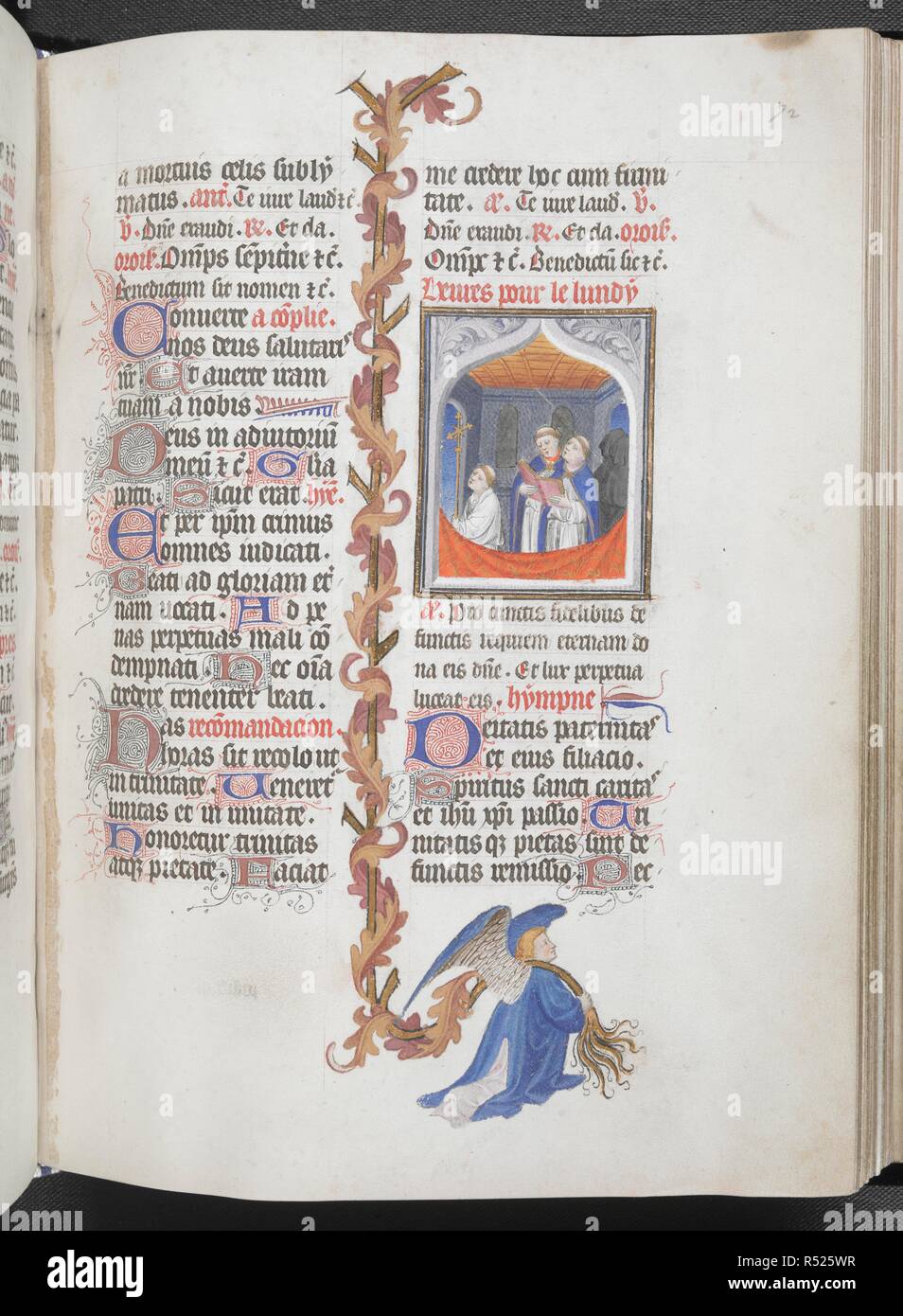 The Divine Office, with partial foliate border carried by an angel. Book of Hours, Use of Paris ('The Hours of RenÃ© d'Anjou'). France, Central (Paris); c.1410. Source: Egerton 1070, f.72. Language: Latin, with French image captions. Stock Photo
