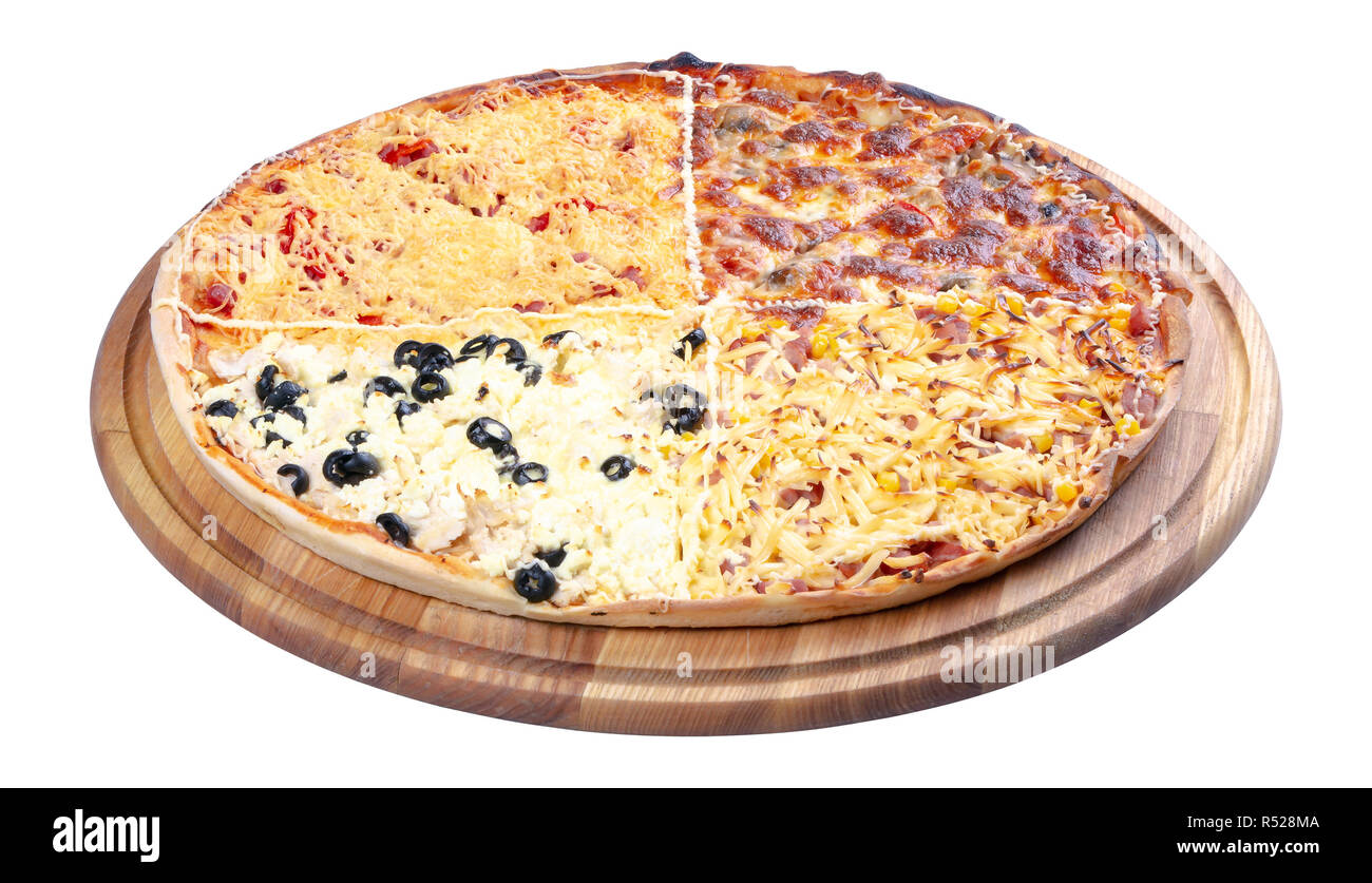 quadruple topping family pizza on the wooden desk isolated. three quarter view. sausage vs pork and corn vs mushrooms vs olives, in different kind of  Stock Photo