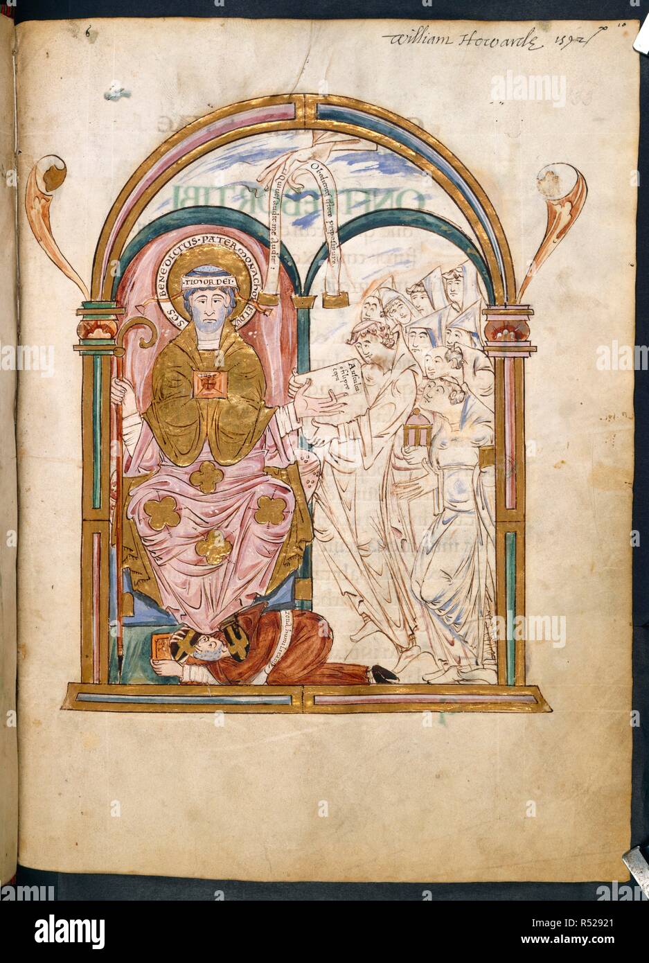 St. Benedict giving the Rule to the monks. Framed by an arch, St. Benedict is seated, while monks approach with an open book. The scribe, Eadui Basan, kneels embracing the saint's feet. Above, the Hand of God appears holding an inscribed scroll,. Eadui Psalter. England [Canterbury]; 1012-1023. Source: Arundel 155, f.133. Language: Latin. Stock Photo