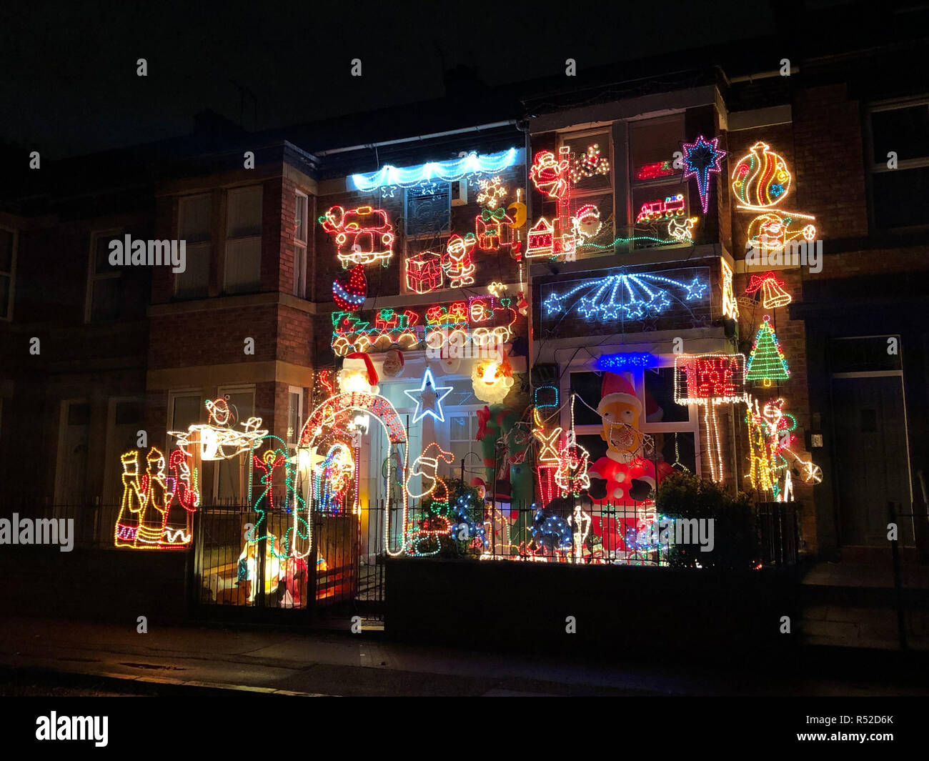 A house in Gateshead is lit up with Christmas lights, it is the 21st year the family have been putting up lights and add new lights every year. Stock Photo