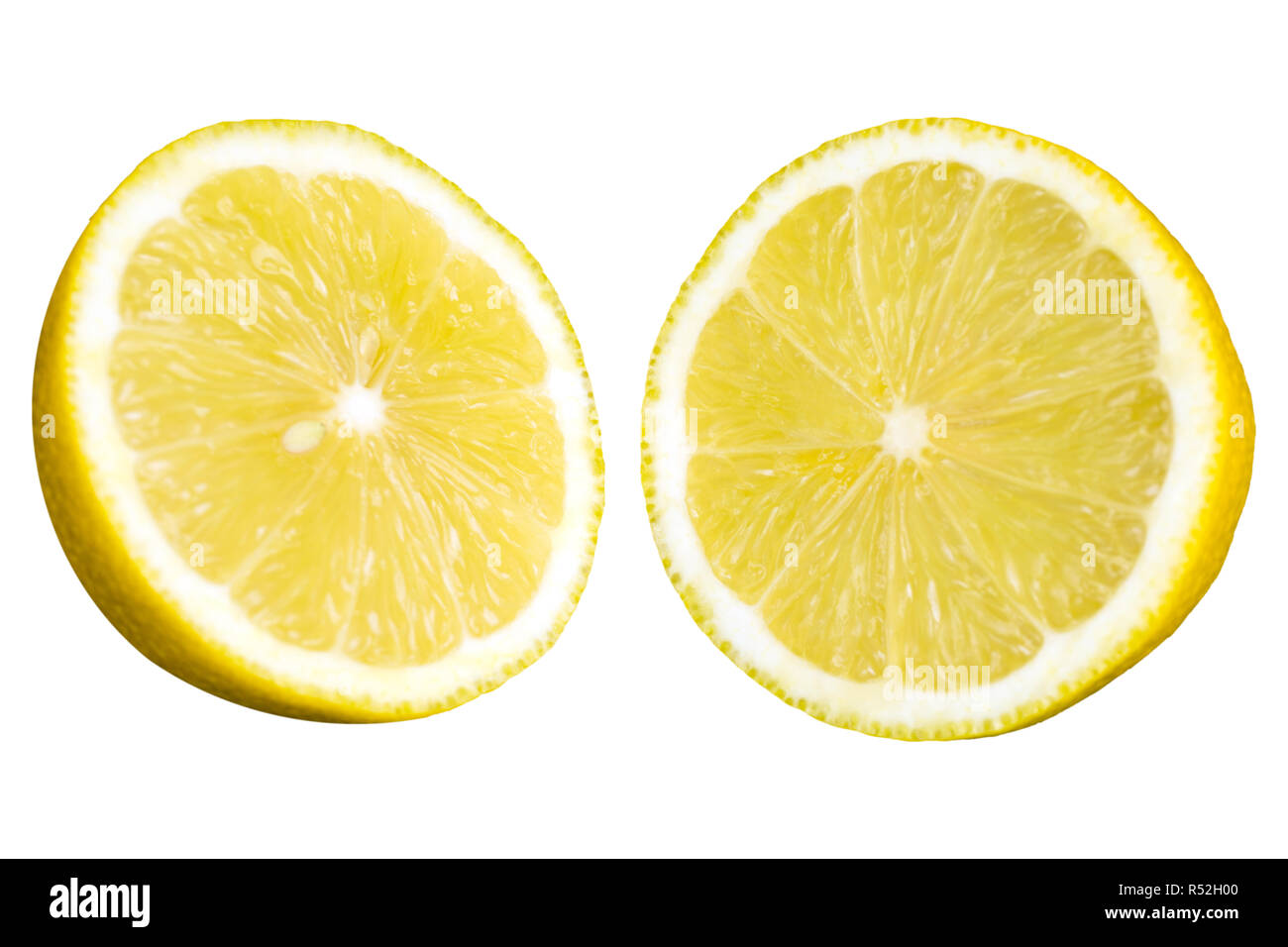 Close-up of sliced Lemons isolated on a white Background-. Stock Photo