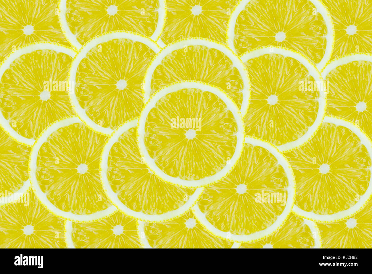 Close-up of stacked sliced Lemons. Stock Photo