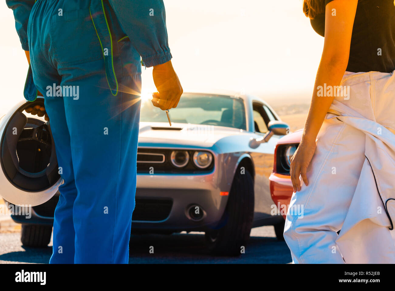 Students Of A Racing School Prepare To Take To Their Cars To The Track On A Bright Sunny Morning Stock Photo