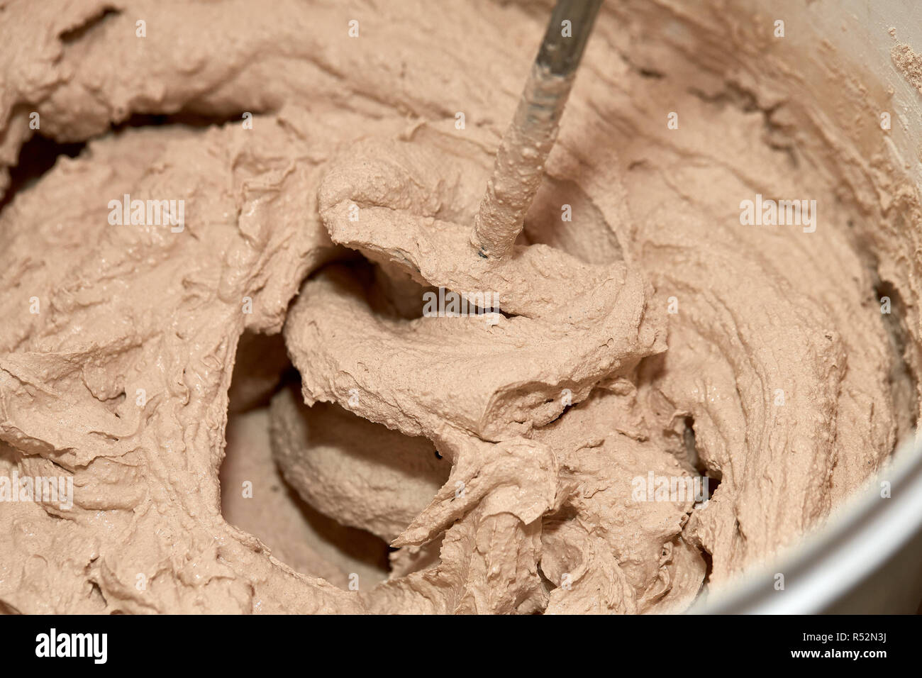 Mixing of a plaster solution by an electric drill Stock Photo Alamy