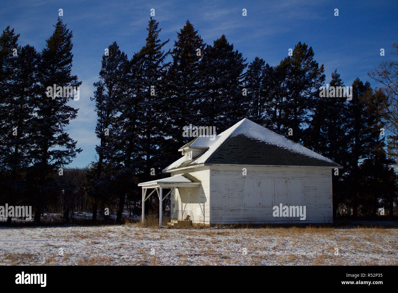 Old One Room School House On A Prairie In Winter With