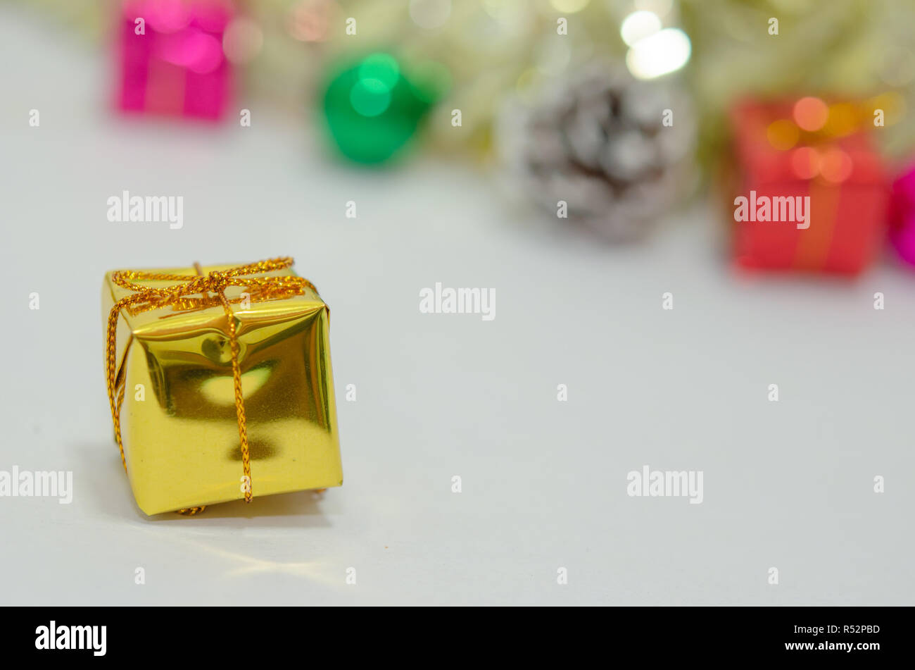 Gift box red and green on a white background. Stock Photo