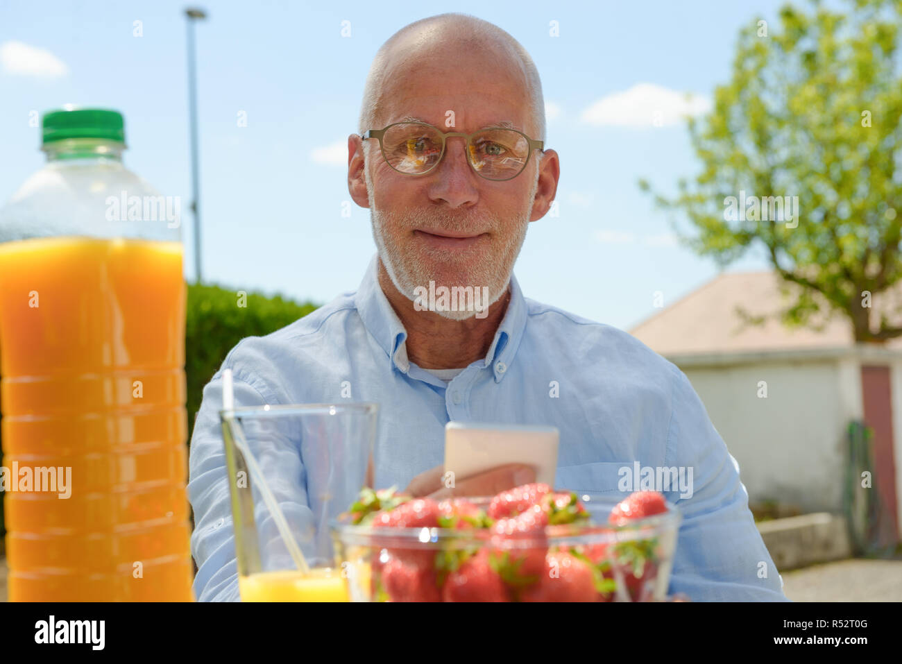 Candid senior man resting outside hi-res stock photography and images ...