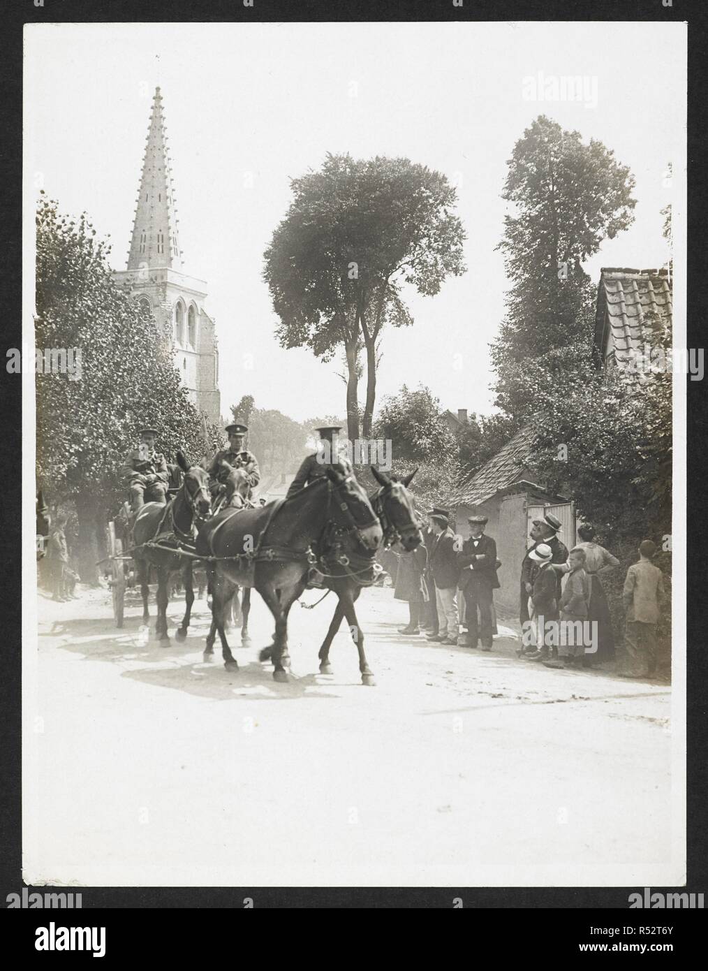 Indian cavalry & transport passing through a French village [EstrÃ©e Blanche], 25th July 1915. Record of the Indian Army in Europe during the First World War. 20th century, 25th July 1915. Gelatin silver prints. Source: Photo 24/(119). Author: Girdwood, H. D. Stock Photo