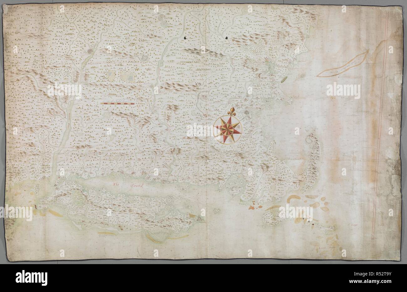A chart of the province of New England, around 1670. A chart of the province of New England, with the soundings on the coast; drawn about 1670, on a scale of 1 2/3 English league to an inch. About 1670. Ms. 5 f. 8 in. x 2 f. 9 in.; 173 x 84 cm.; Scale 1: 316 787. 1 2/3 English league to an inch. Source: Add.5414.21. Stock Photo