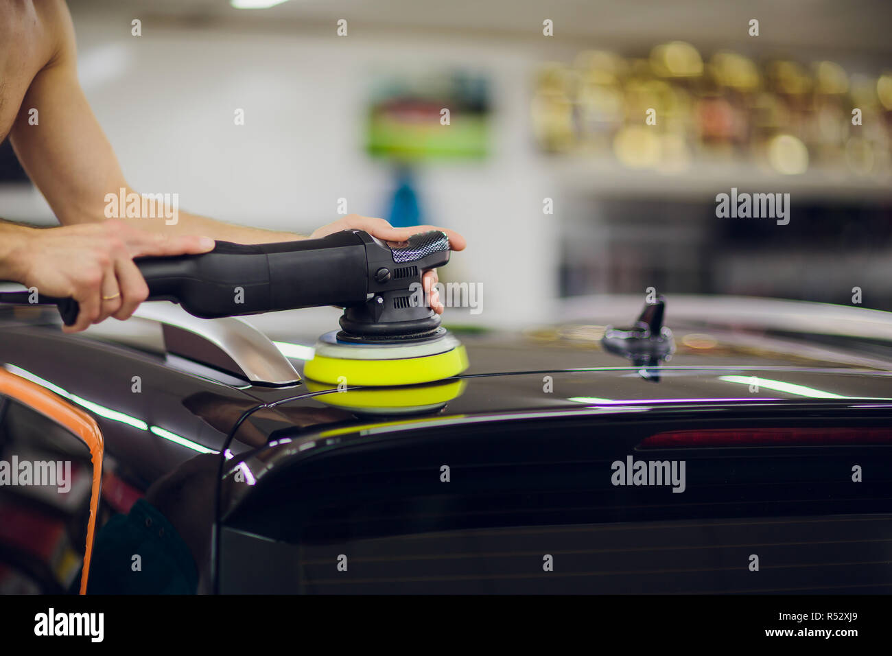 Polished black car polishing machine polished finishing. Car detailing