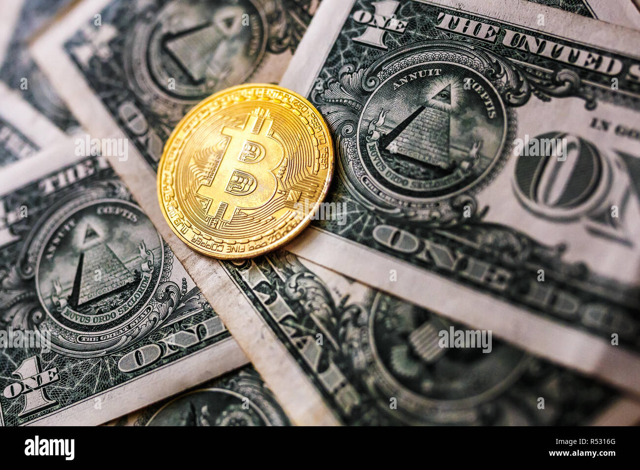 virtual money golden bitcoin on one dollar bill background. Concept of new  world order of cryptocurrency. Exchange bitcoin cash for a dollar Stock  Photo - Alamy